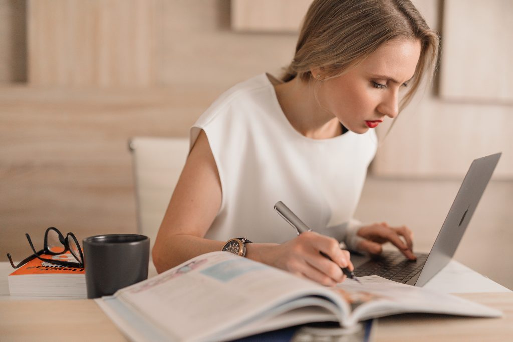 woman working on a timesheet